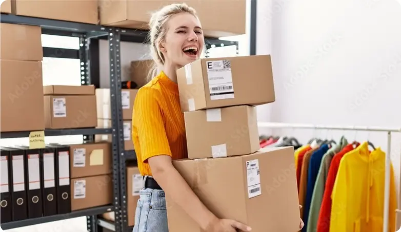 Woman carrying boxes