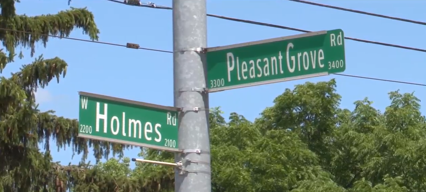 Pleasant Grove & Holmes street sign